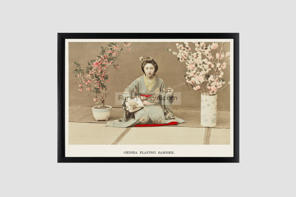 Geisha Playing Samisen, hand–colored albumen silver print from Japan. Described and Illustrated by the Japanese (1897) by Kazumasa Ogawa.